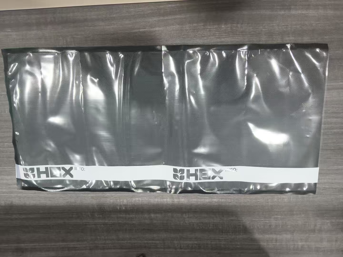 Black and clear vacuum storage bags front view